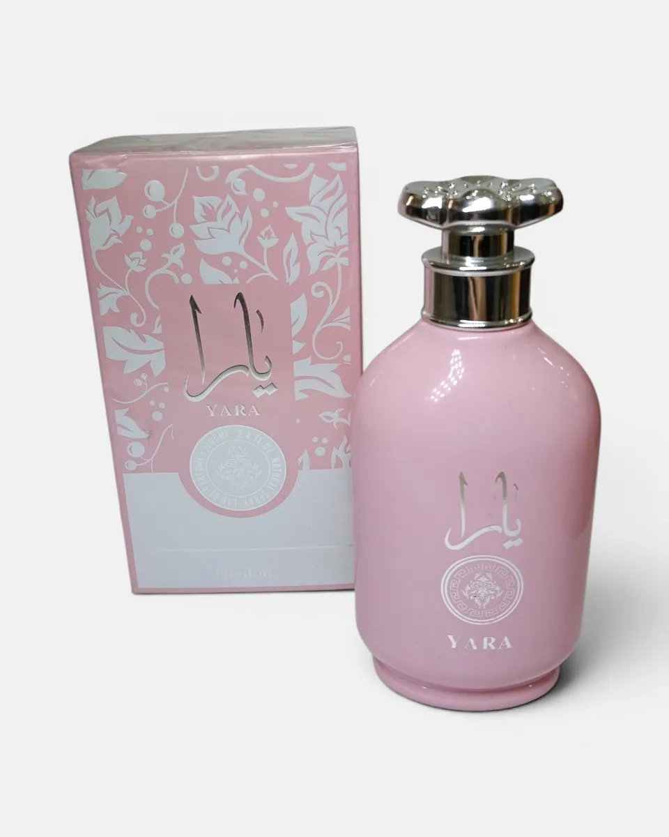 Perfume Yara de Diviloo, frasco rosa con tapa plateada y su caja rosa